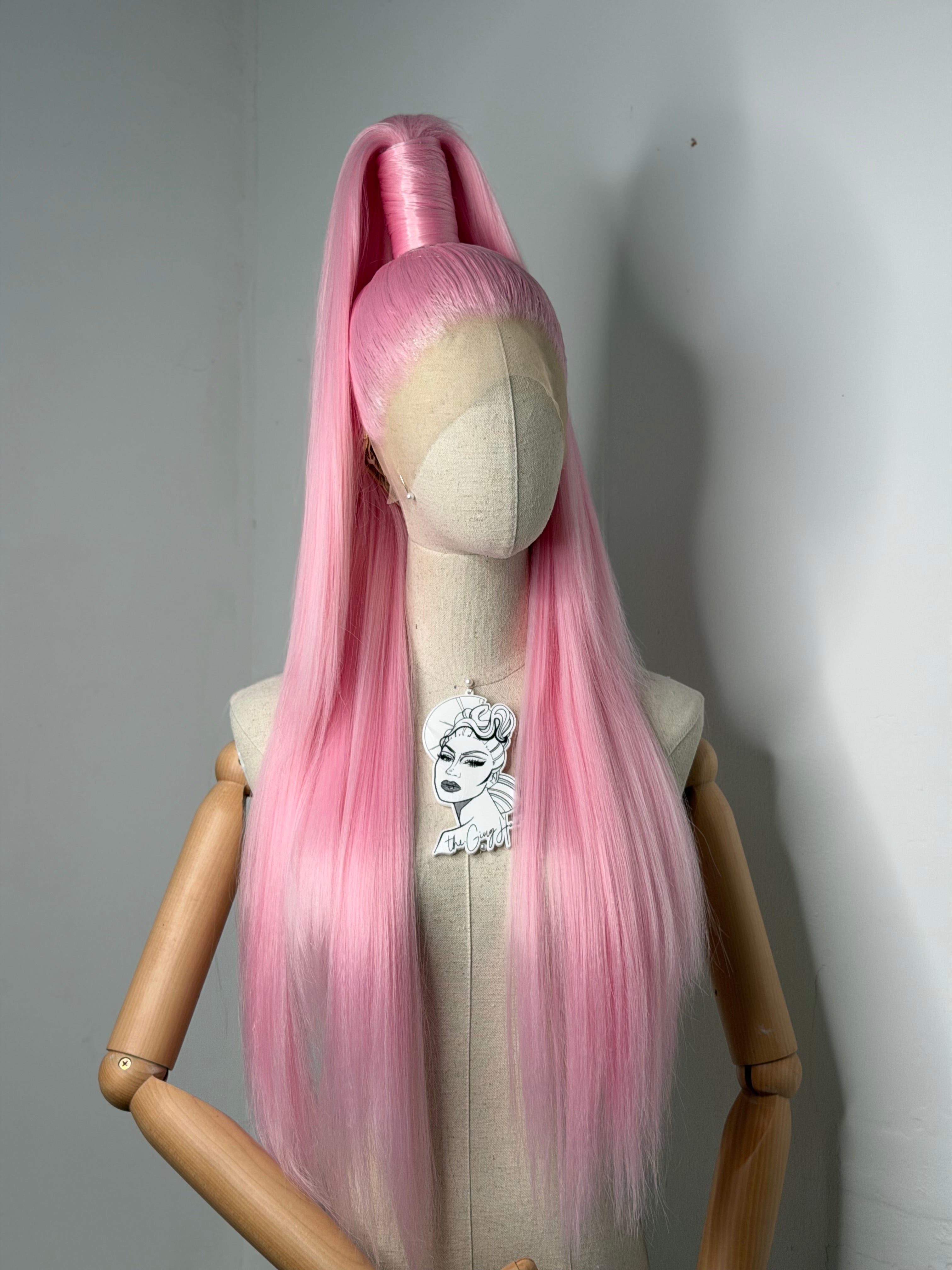 Sleek half up ponytail pink