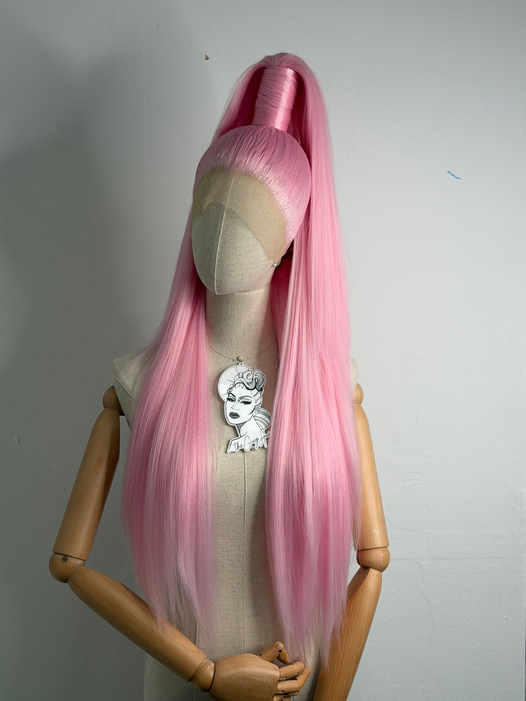 Sleek half up ponytail pink