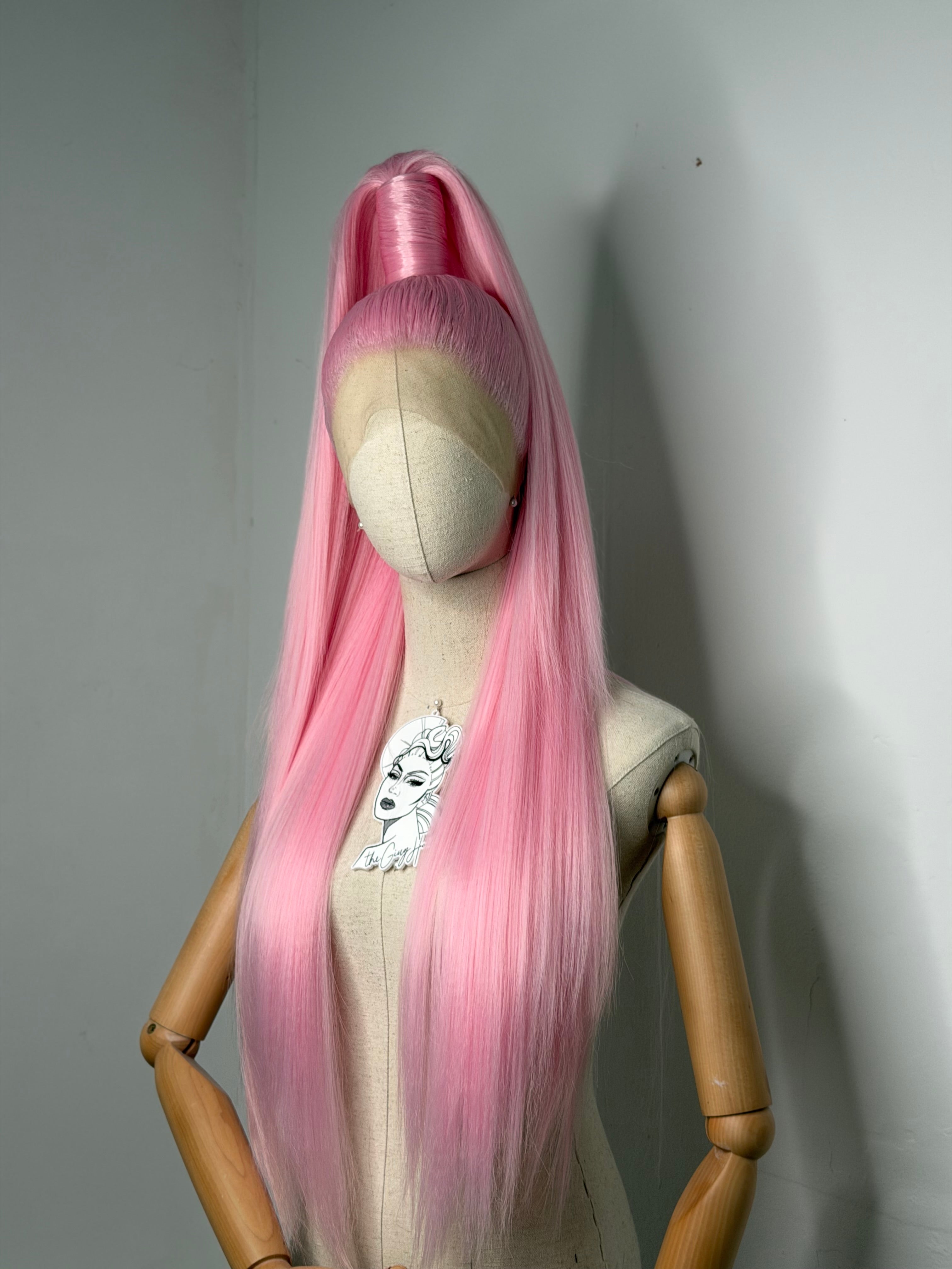 Sleek half up ponytail pink