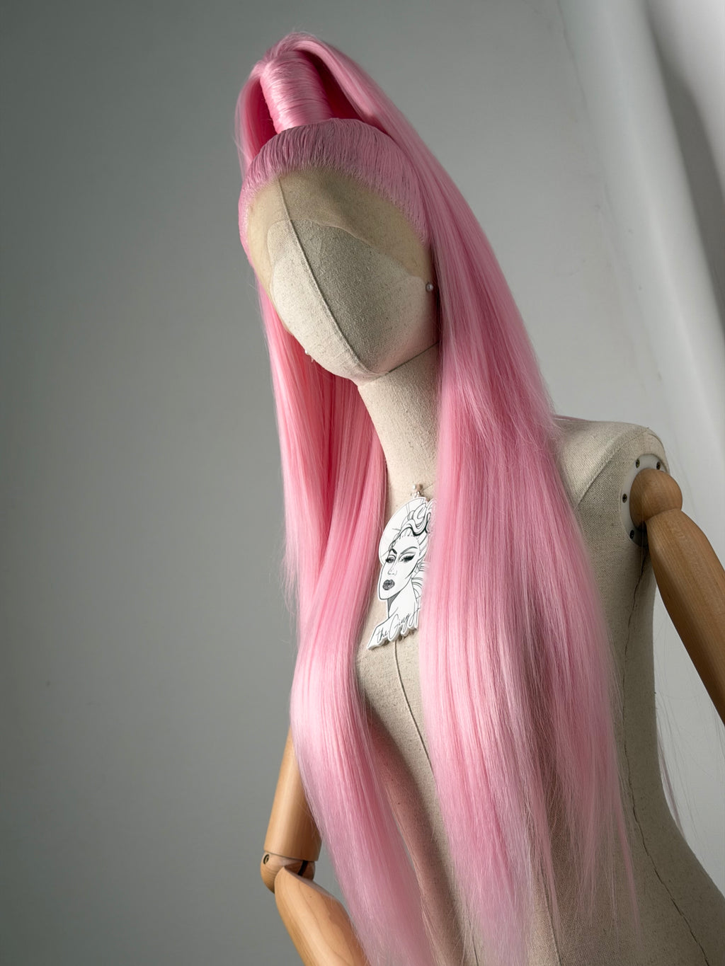 Sleek half up ponytail pink
