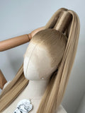 Sleek half up ponytail cool blonde