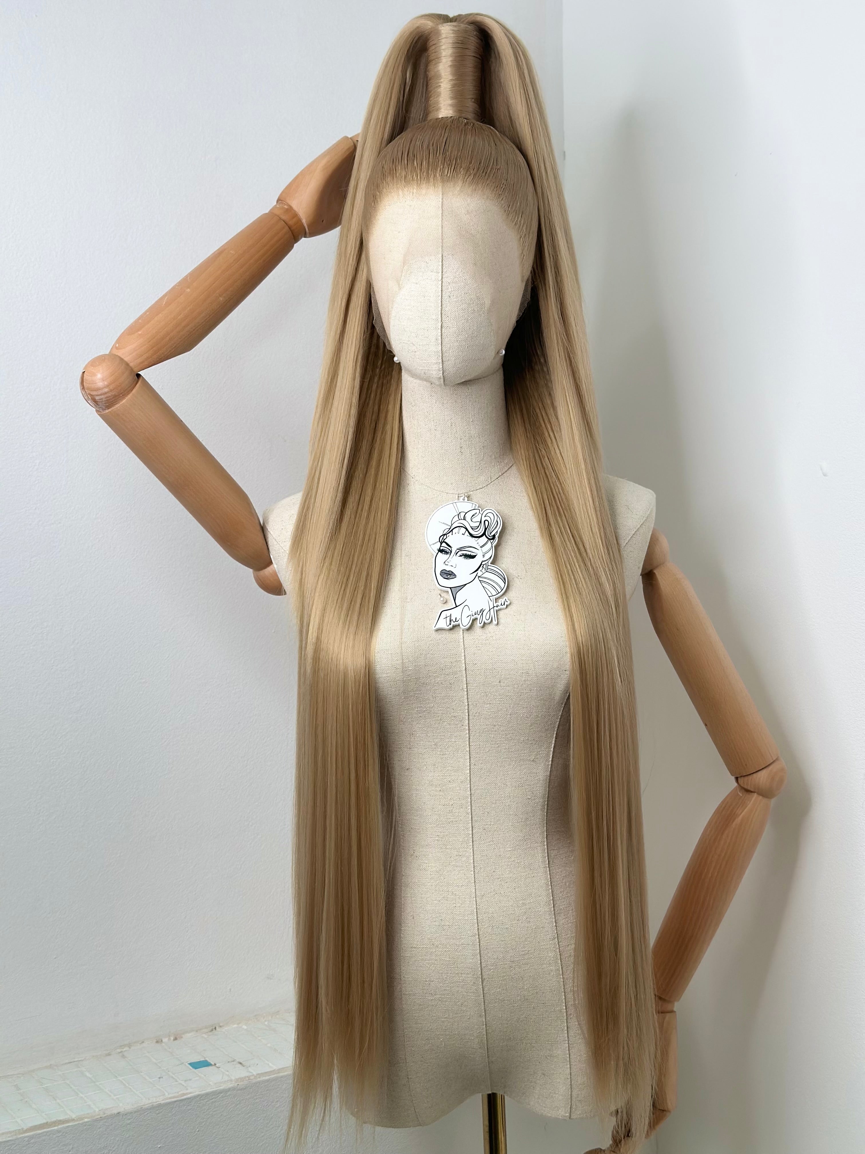 Sleek half up ponytail cool blonde