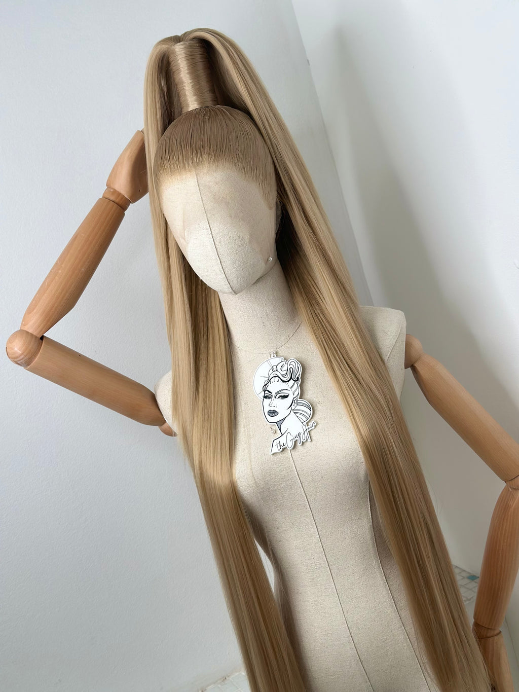 Sleek half up ponytail cool blonde