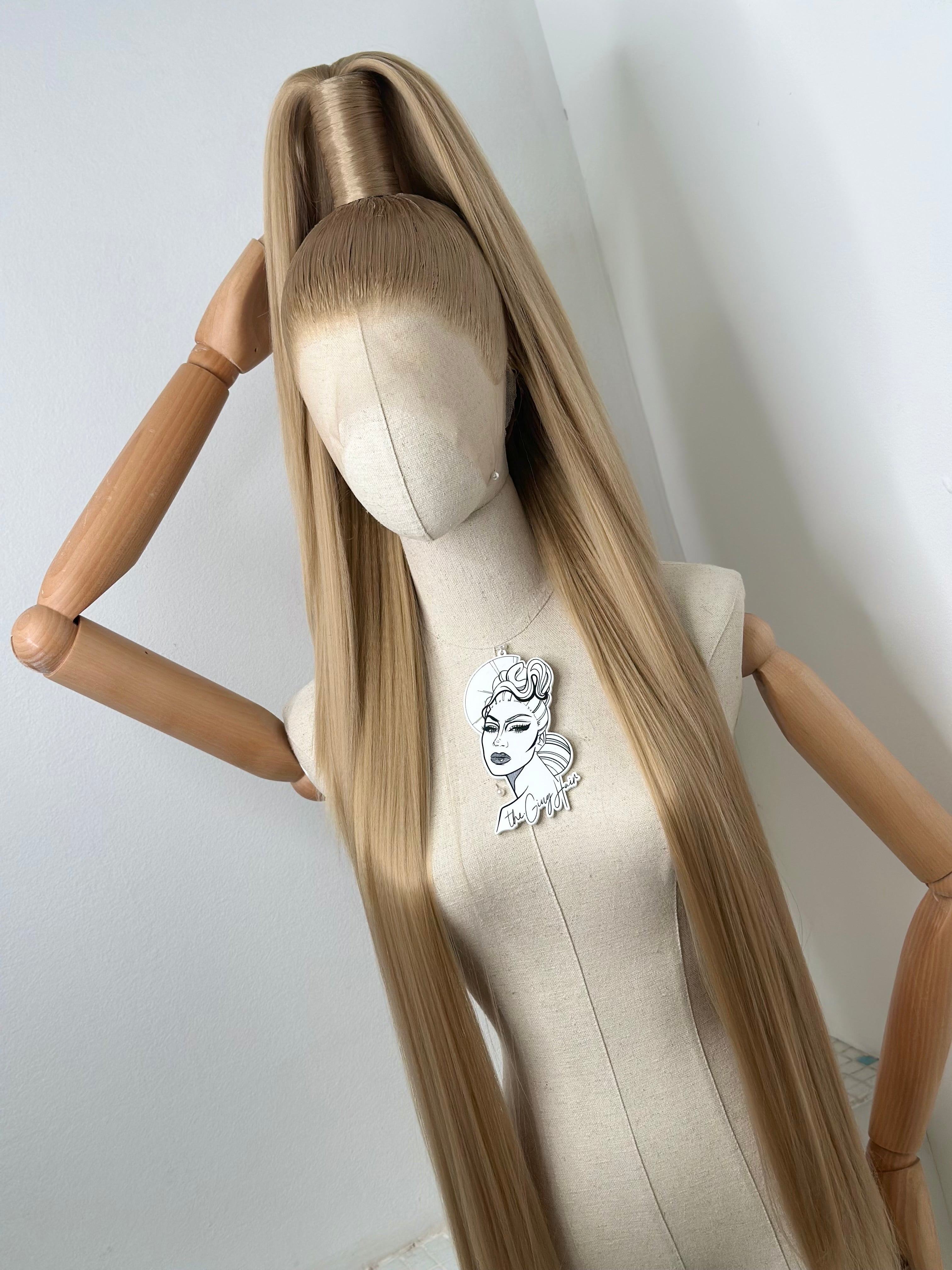 Sleek half up ponytail cool blonde