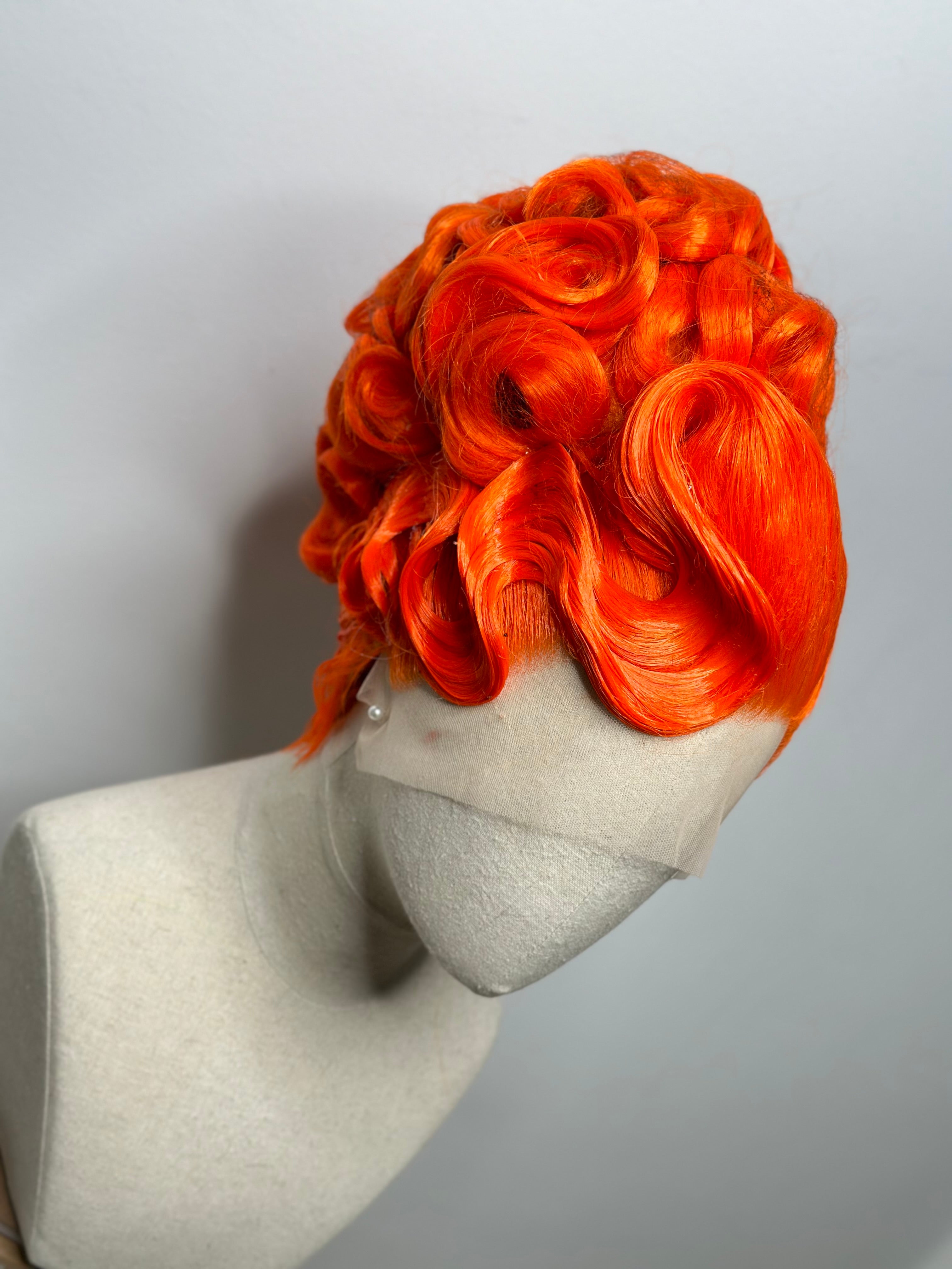 Classy Asymmetrical Updo in orange