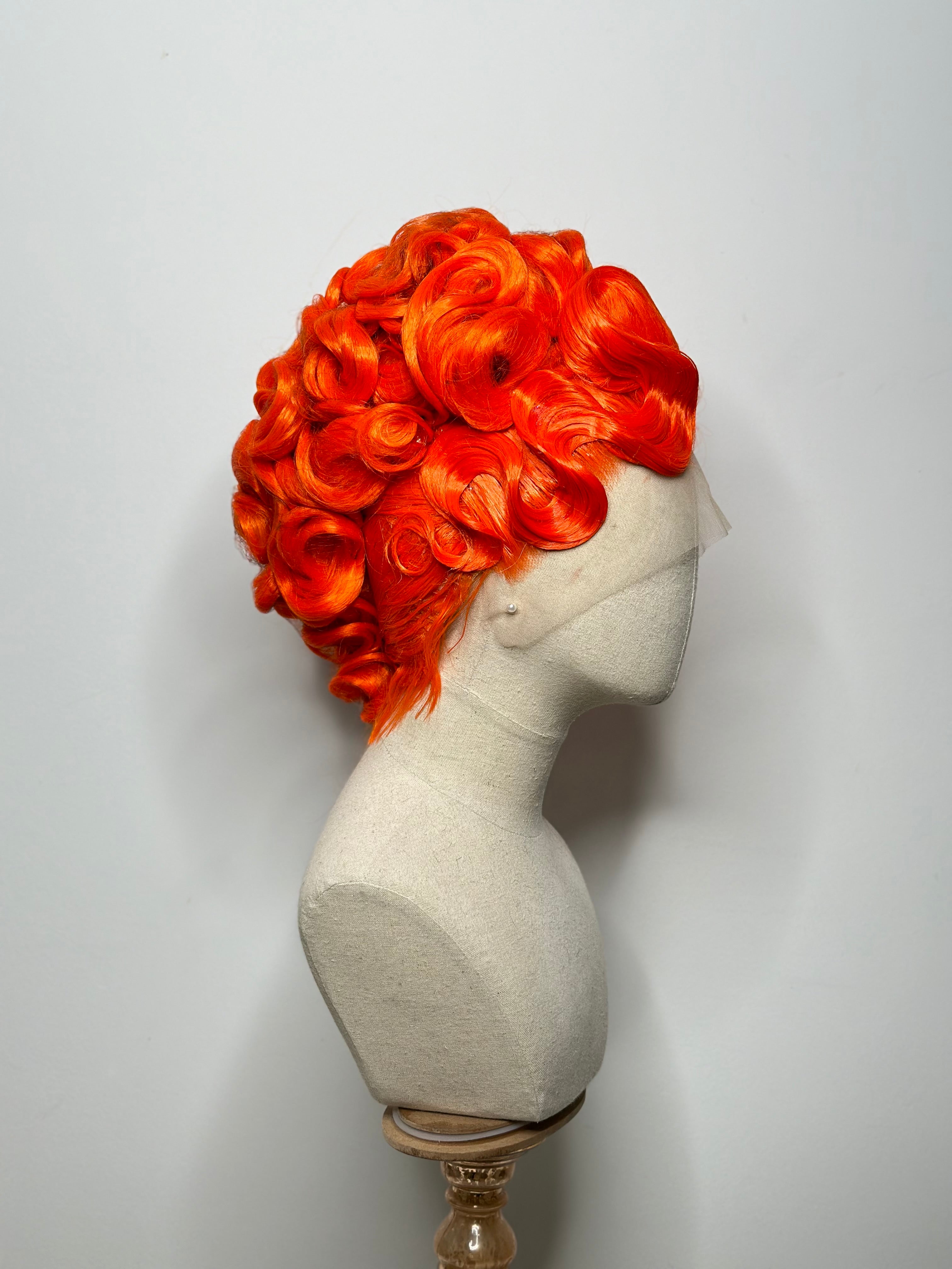 Classy Asymmetrical Updo in orange
