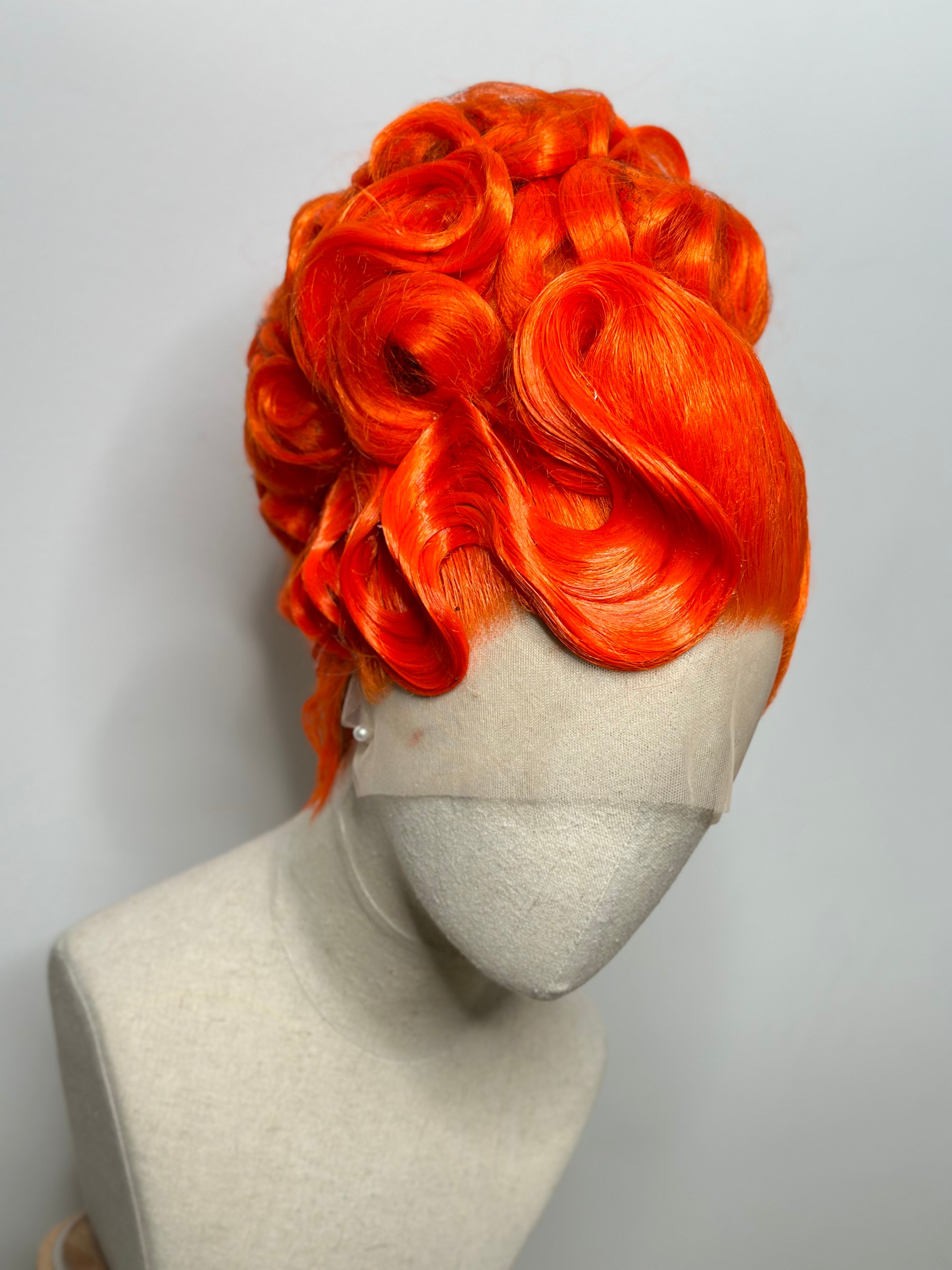 Classy Asymmetrical Updo in orange