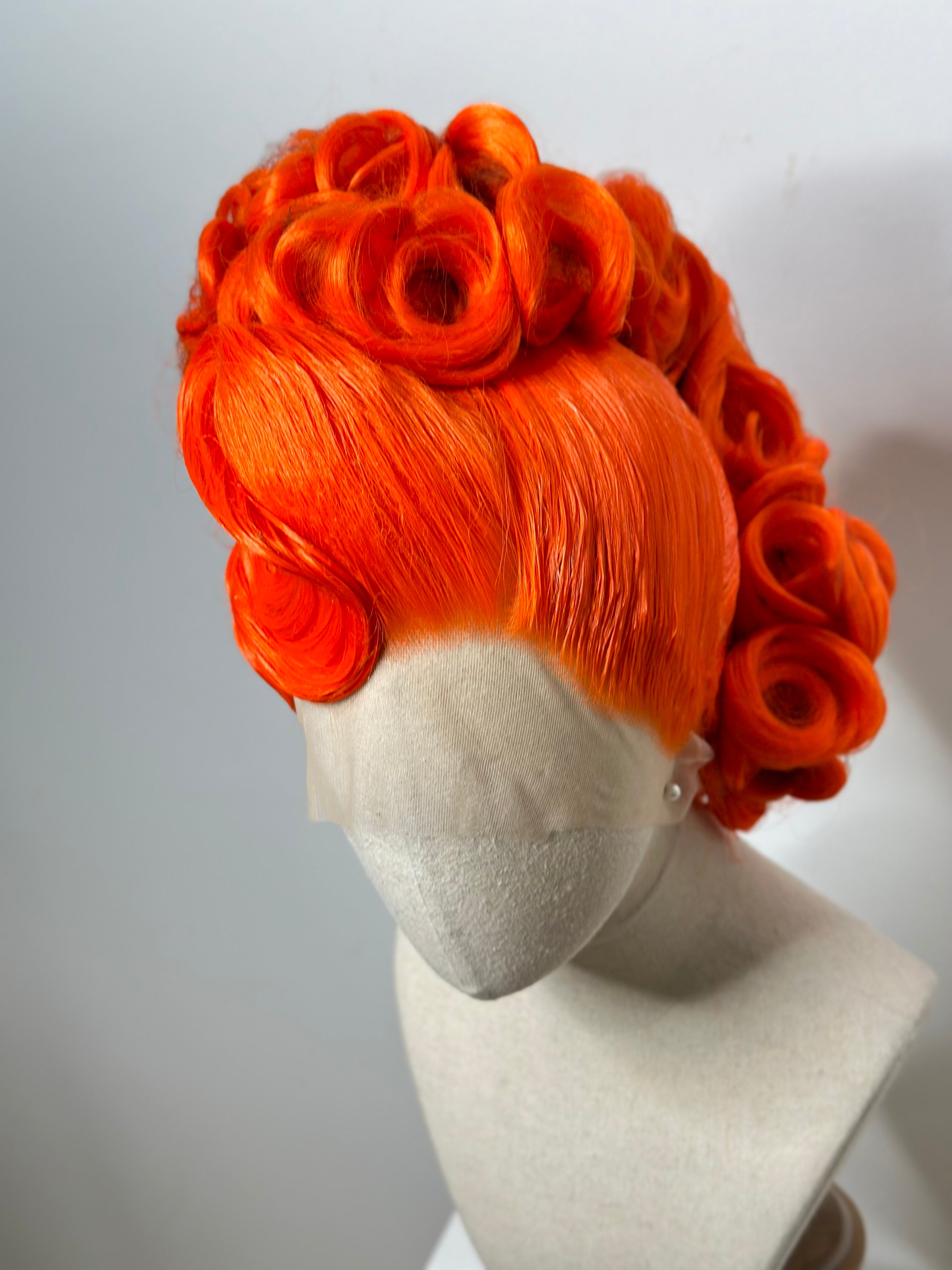 Classy Asymmetrical Updo in orange