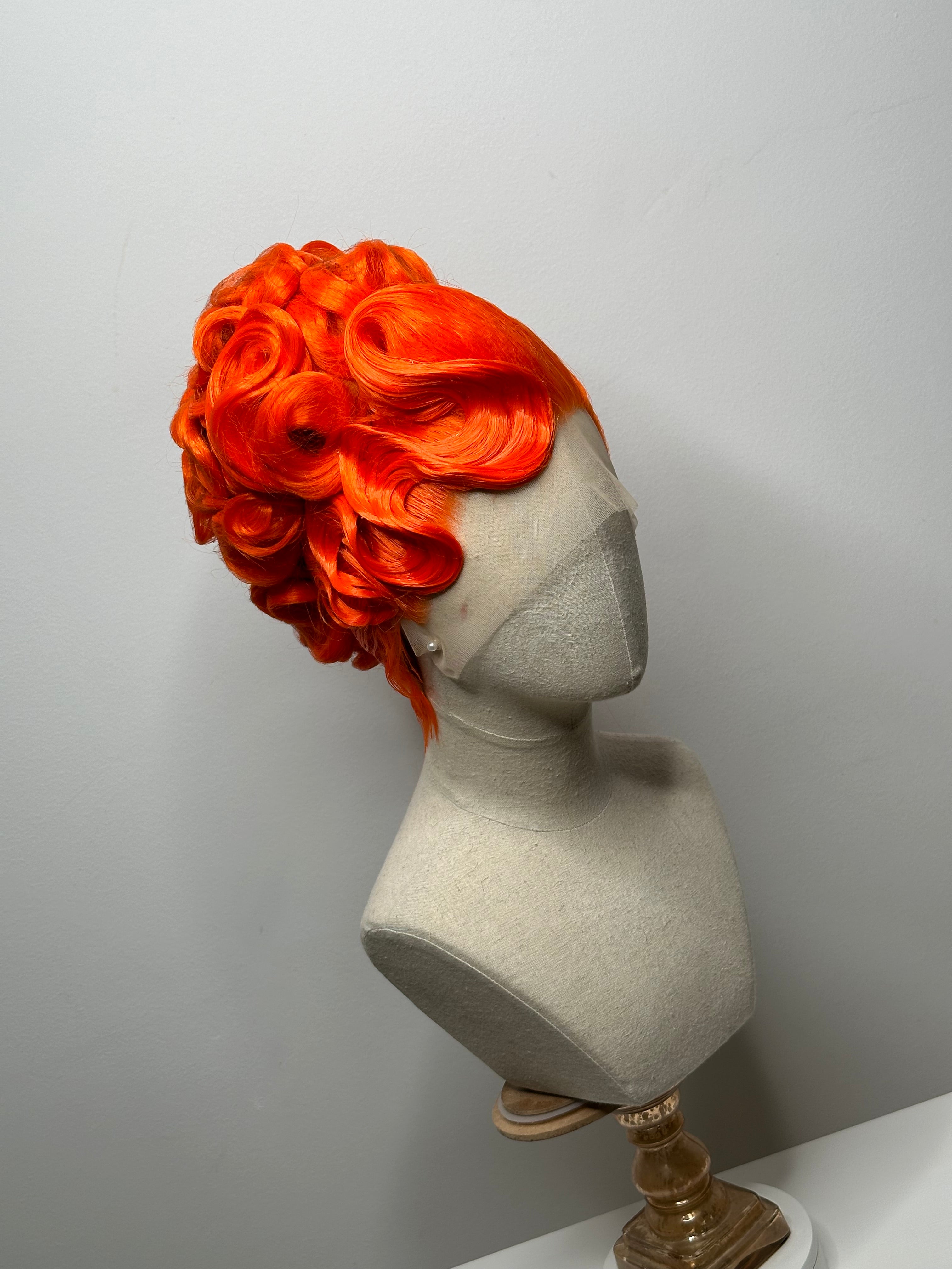 Classy Asymmetrical Updo in orange