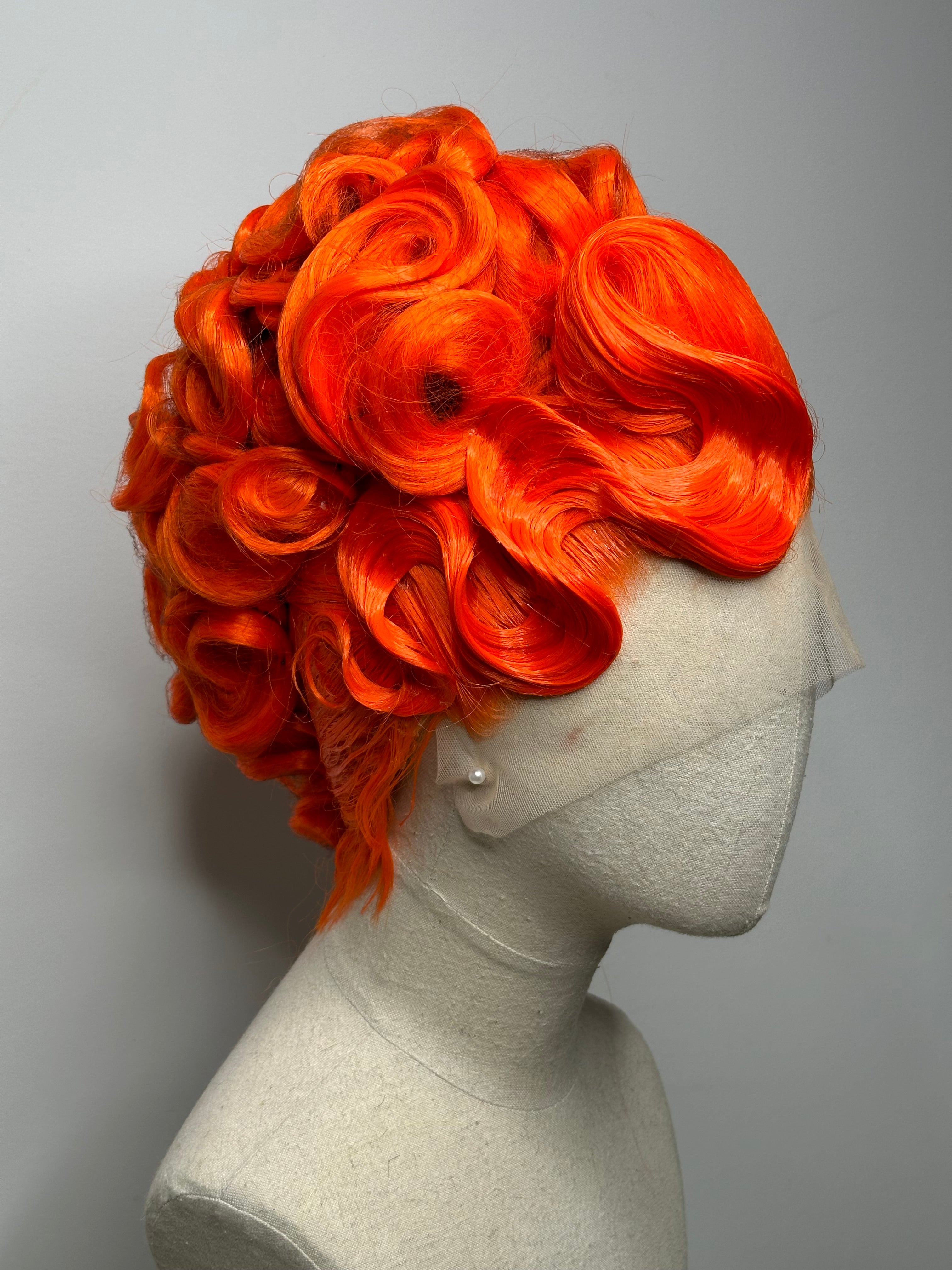 Classy Asymmetrical Updo in orange