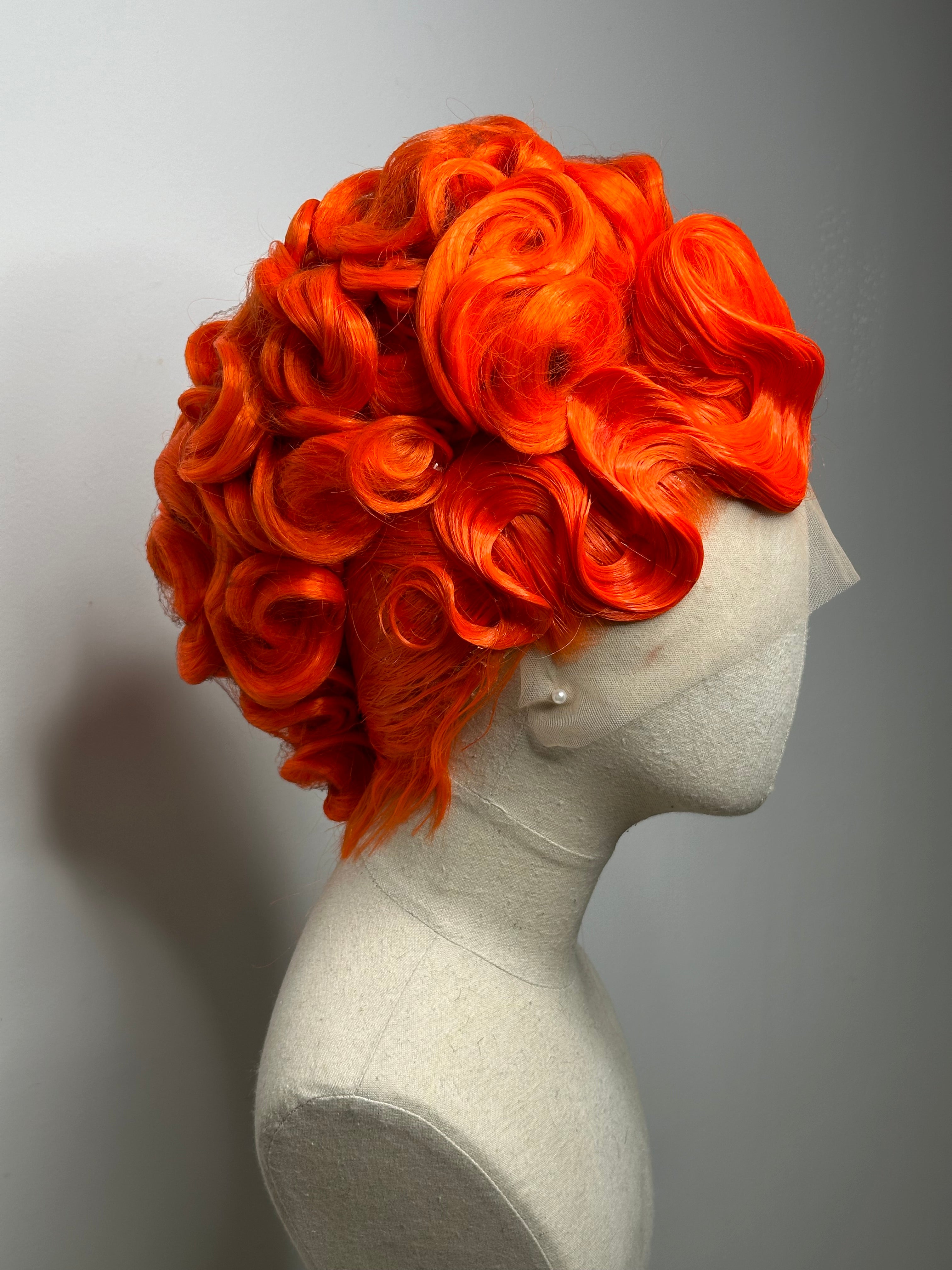 Classy Asymmetrical Updo in orange